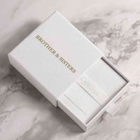 Thumbnail for Elegant packaging of Brother & Sisters for the Sunflower Photo Necklace, featuring a white box with gold lettering.