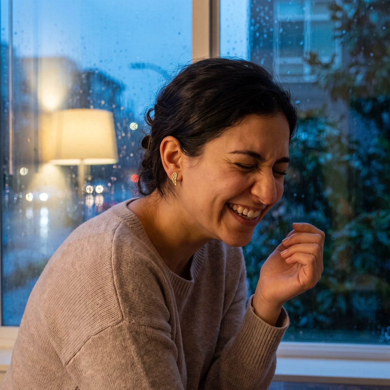 Woman laughing, wearing the gold stud earrings | SKU: 42008-gold
