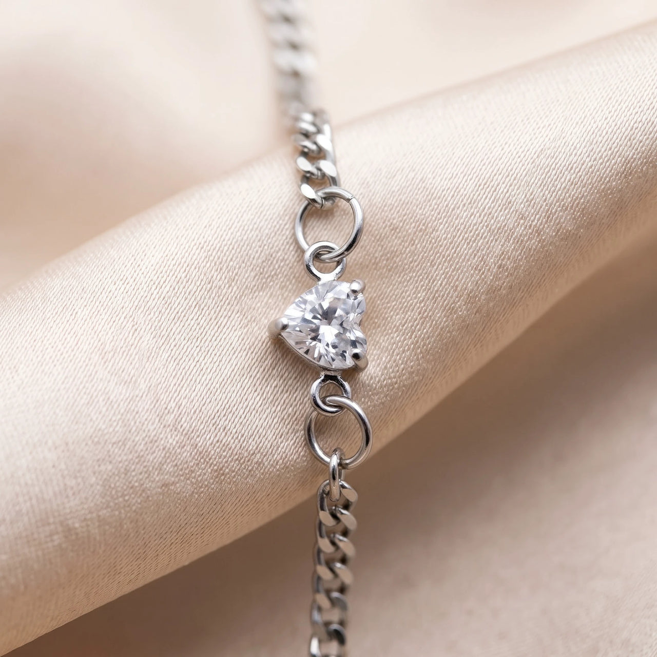 Heart Bond Matching Bracelet Set in Silver — close-up of the heart crystal in its four-prong setting, held by two jump rings