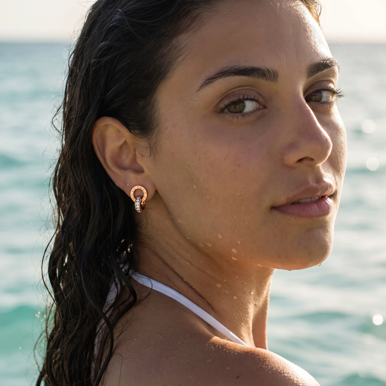 Rose gold huggie earrings — worn in the water, waterproof, rose gold | SKU: 11137578-rose-gold