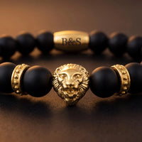 Thumbnail for Gold Lion & Black Stones Bracelet – macro detail of the lion head | Brother & Sisters | SKU: 20712286-gold-XS-14-15, 20712286-gold-S-16-17, 20712286-gold-M-18-19, 20712286-gold-L-20-21, 20712286-gold-XL-22-23