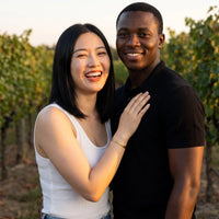 Thumbnail for Couple moment, she wears the Never Forget To Dream bracelet in gold | SKU: nftd-g