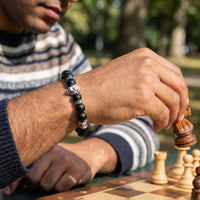 Thumbnail for White Gold Lion & Black Stones Bracelet – held in a man's hand | Brother & Sisters | SKU: 20712286-silver-XS-14-15, 20712286-silver-S-16-17, 20712286-silver-M-18-19, 20712286-silver-L-20-21, 20712286-silver-XL-22-23
